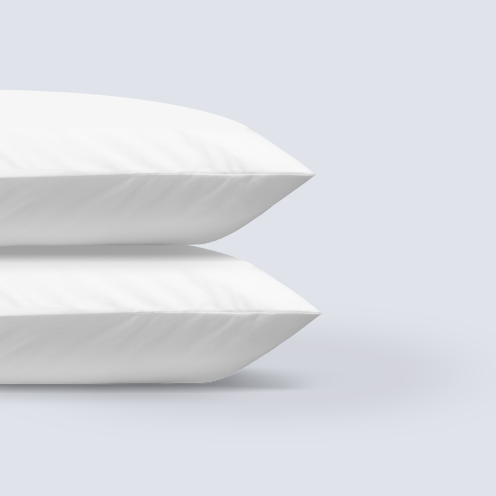 Pillow protectors on pillows