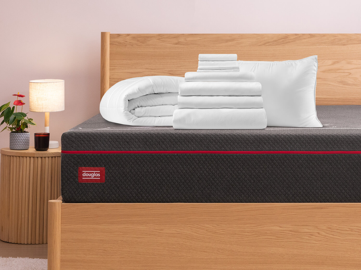 Comfort Sleep Bundle items on top of a Douglas hybrid mattress