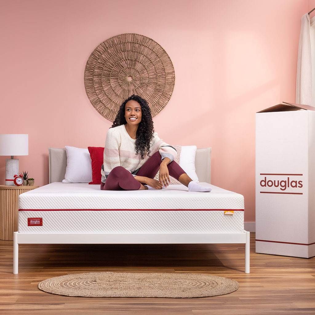 Unboxed Douglas mattress as part of a vibrant bedroom
