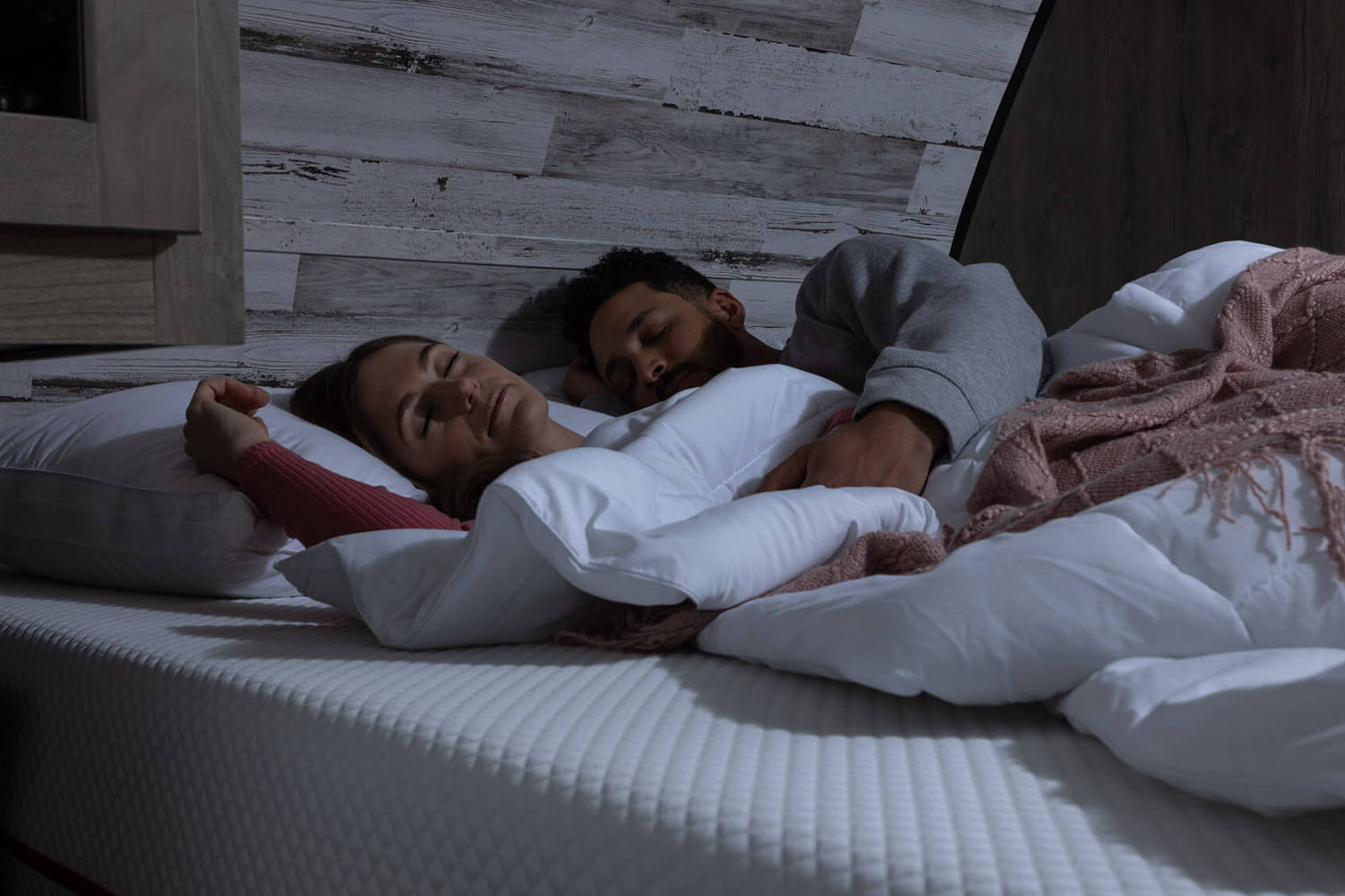 Couple laying inside their RV on the Douglas Summit RV Mattress