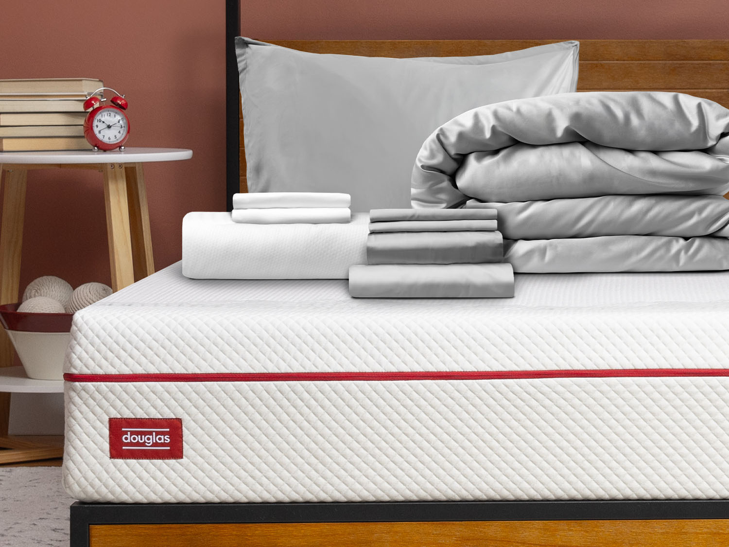 Premium Sleep Bundle items on top of a Douglas mattress