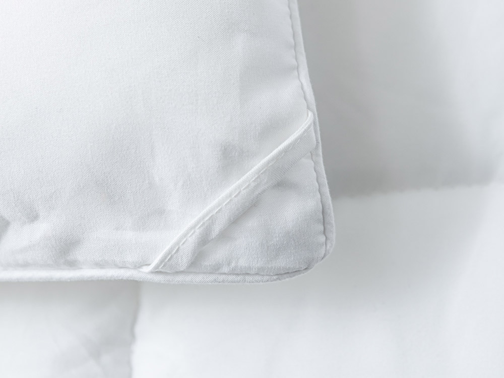 Closeup of corner loop on down alternative duvet