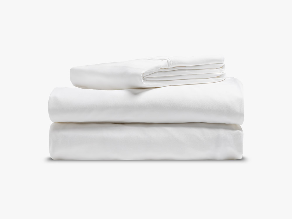 Sateen cotton sheets folded neatly