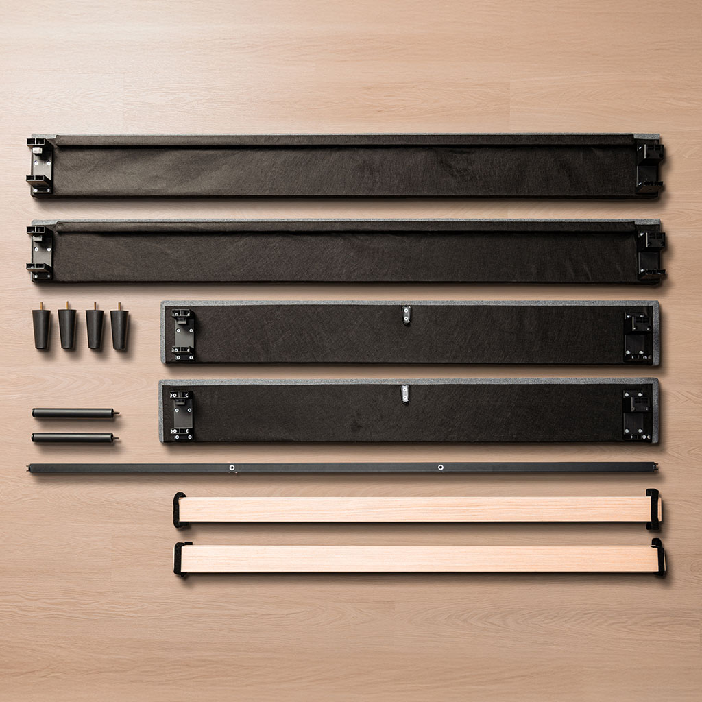 Unassembled pieces of the platform bed