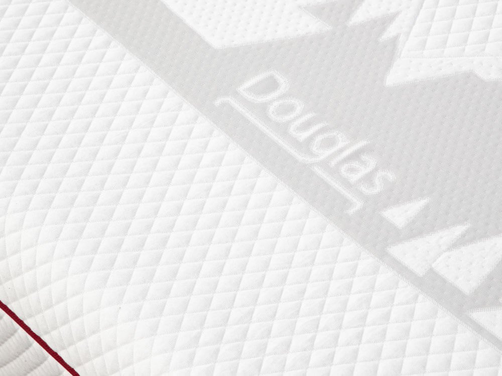 Douglas Mattress Mountain Cover | GoodMorning.com Douglas mountainscape logo on the white top cover of the Douglas mattress