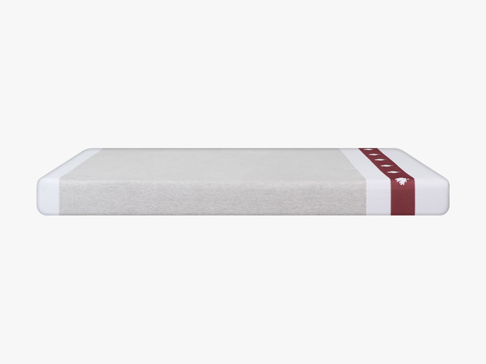 Sideview of the Juno mattress on a white background.