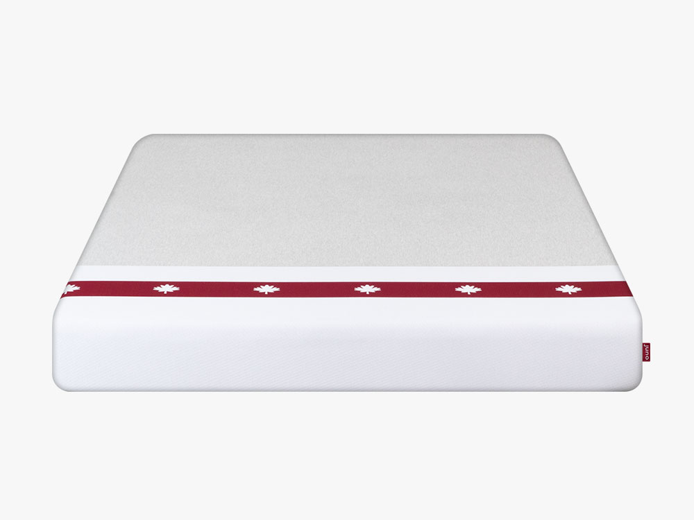 Juno mattress on a white background as shot from above.