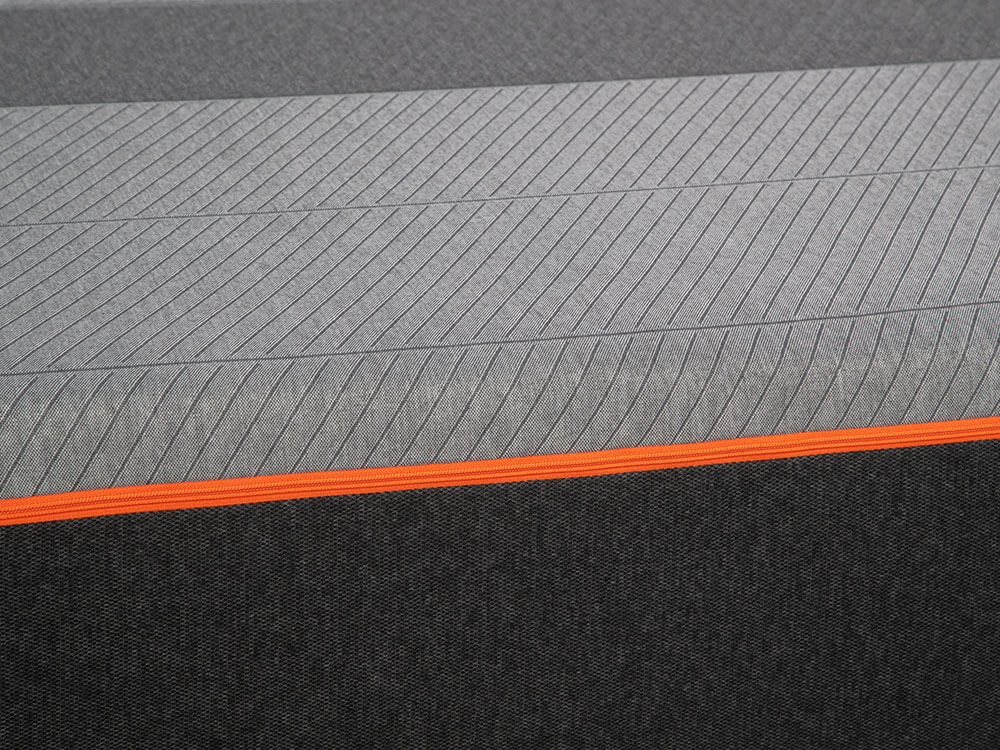Recore Mattress Cover & Zipper | GoodMorning.com Close-up of the grey silver-infused antimicrobial top cover and the orange zipper of the Recore performance latex mattress
